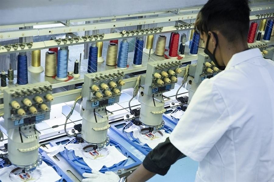 Embroidery machines stitching logos with Madeira threads at the Sungrace factory
